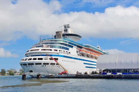 Cruise ship park at Miami dock with cloud and blue sky.のeditorial素材