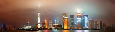Shanghai city skyline at night over Huangpu riverのeditorial素材