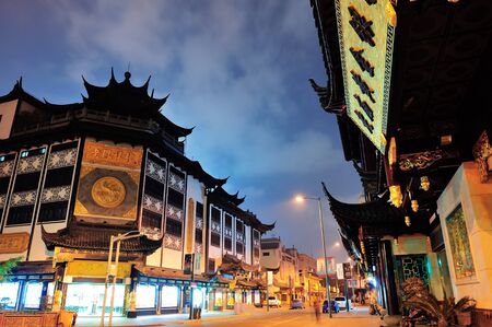 SHANGHAI, CHINA - MAY 30: Chenghuangmiao street at night with pagoda style buildings on May 30, 2012 in Shanghai. It is the largest city by population in the world with 23 million in 2010のeditorial素材