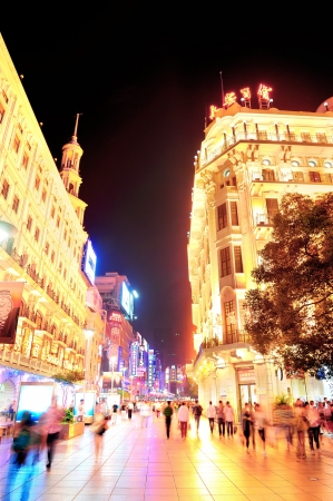 SHANGHAI, CHINA - MAY 28: Nanjing Road street night view on May 28, 2012 in Shanghai, China. Nanjing Road is 6km long as the world's longest shopping district with 1M visitors daily.のeditorial素材