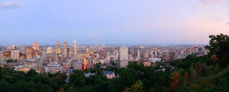 Montreal at dusk panorama with urban skyscrapers viewed from Mont Royalの写真素材