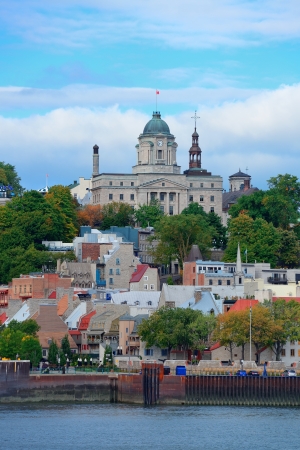 Quebec City skyline over river with blue sky and cloud.の写真素材