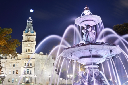 Parliament Building and fountain at night in Quebec Cityの写真素材