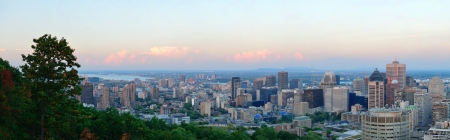 Montreal city skyline panorama at sunset viewed from Mont Royal with urban skyscrapers の写真素材