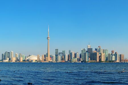 Toronto skyline panorama over lake with urban architecture の写真素材