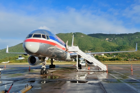 ST THOMAS, VIRGIN ISLANDS - JAN 7: Airplane at airport prepare to depart on January 7, 2013 in St Thomas, Virgin Islands. Cyril E. King Airport is the busiest in the United States Virgin Islandsのeditorial素材