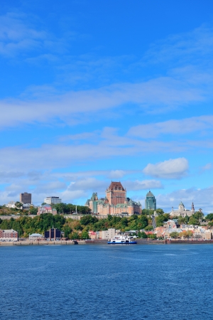 Quebec City skyline over river with blue sky and cloud.の写真素材