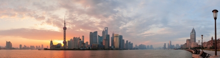 Shanghai morning city skyline silhouette over river