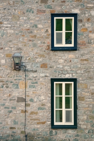Ancient window of old building in Quebec Cityの写真素材