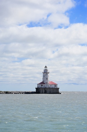 Light House of Chicago in Lake Michigan with cloud and blue sky.の写真素材