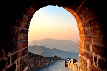 Great Wall in the morning with sunrise and colorful sky in Beijing, China.の写真素材
