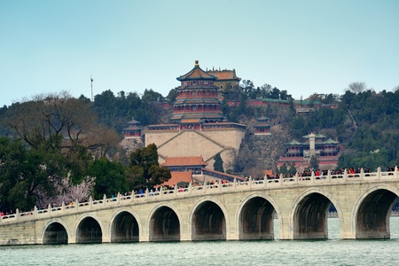 BEIJING, CHINA - APR 5: Summer Palace with bridge over lake on April 5, 2013 in Beijing, China. It was formerly imperial palace and now is the World Heritage Site in Beijing.のeditorial素材