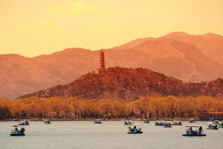 Summer Palace with historical architecture, lake and boat in Beijing.のeditorial素材