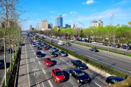 BEIJING, CHINA - APR 6: Beijing street view with busy traffic on April 6, 2013 in Beijing, China. It is the second largest Chinese city and the nation's political, cultural, educational center.のeditorial素材