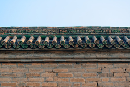 Old roof of Chinese buildings with beautiful pattern in Beijing.の写真素材