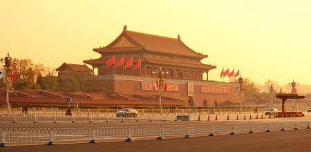 BEIJING, CHINA - APR 6: Tiananmen sunrise with street on April 6, 2013 in Beijing, China. Tiananmen is a famous monument in Beijing and serves as a national symbol.のeditorial素材