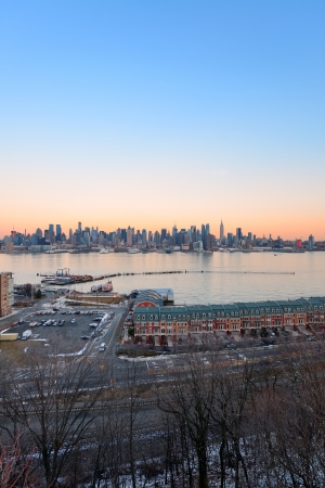 New York City midtown Manhattan sunset skyline panorama view over Hudson Riverの写真素材