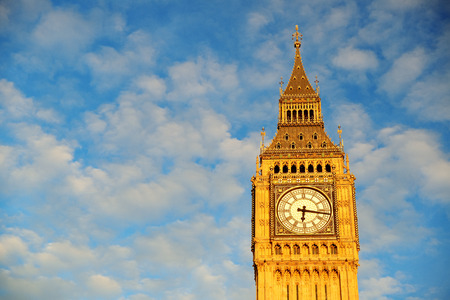 Big Ben closeup in London with blue sky.