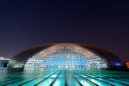 BEIJING, CHINA - APR 3: National Centre for the Performing Arts NCPA at night on April 3, 2013 in Beijing, China. Cost 2.8B CNY, it seats 5,452 people. The first performance was held in December 2007のeditorial素材