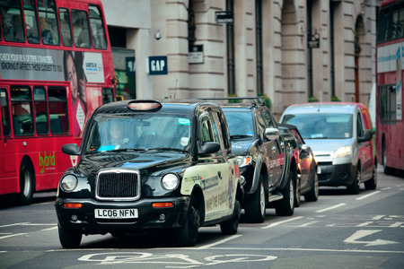 LONDON, UK - SEP 27: Street with busy traffic on September 27, 2013 in London, UK. London is the world's most visited city and the capital of UK.のeditorial素材