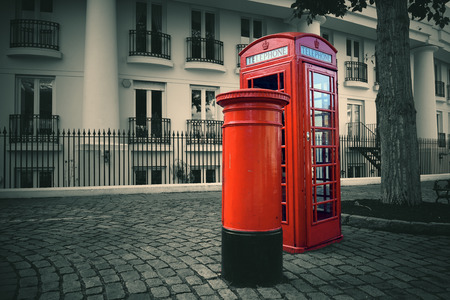 Telephone box and mail box in London street.の写真素材