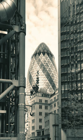 LONDON, UK - SEP 27: Financial district office buildings in street on September 27, 2013 in London, UK. London is the world's greatest foreign exchange market with major trade conducted in the district.のeditorial素材