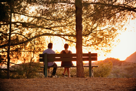 A couple watch sunset in Los Angelesの写真素材