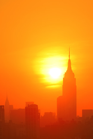 NEW YORK CITY, NY - JUL 11: Empire State Building at sunrise on July 11, 2014 in New York City. It is a 102-story landmark and was worldのeditorial素材