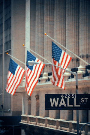 NEW YORK CITY - SEP 5: Wall Street with skyscrapers on September 5, 2014 in Manhattan, New York City. Wall Street financial district, with major exchanges headquarters, has been called the world's principal financial center.のeditorial素材