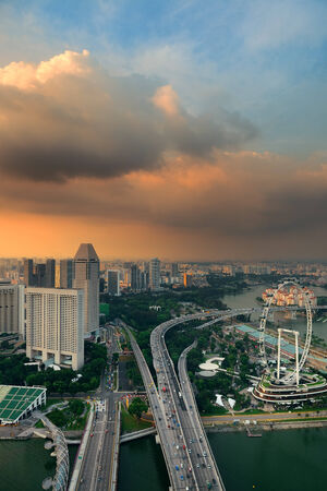 Singapore rooftop view with urban skyscrapers at sunset.のeditorial素材