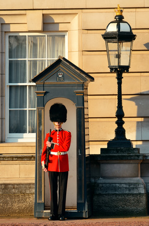 LONDON, UK - SEP 27: British Guard on duty on September 27, 2013 in London, UK. The ceremony is one of the top attractions in London and UK military traditions.のeditorial素材