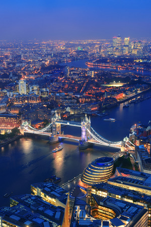 London aerial view panorama at night with urban architectures and Tower Bridge.の写真素材