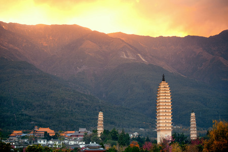 Ancient pagoda in Dali old town at sunset, Yunnan, China.の写真素材