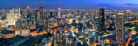 Osaka urban city at night panorama rooftop view. Japan.の写真素材