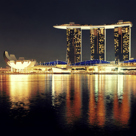 SINGAPORE - APR 5: Marina Bay Sands hotel closeup at night on April 5, 2014 in Singapore. It is the world's most expensive building with cost of US$ 4.7 billion and landmark of Singapore.のeditorial素材