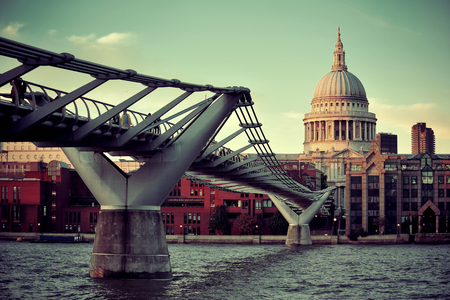 St Paul's cathedral in London and bridge over Thames River.の写真素材