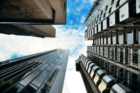 LONDON, UK - SEP 27: Financial district office buildings in street on September 27, 2013 in London, UK. London is the world's greatest foreign exchange market with major trade conducted in the district.のeditorial素材