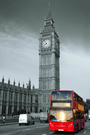 Double-deck red bus on Westminster Bridge with Big Ben in London.のeditorial素材