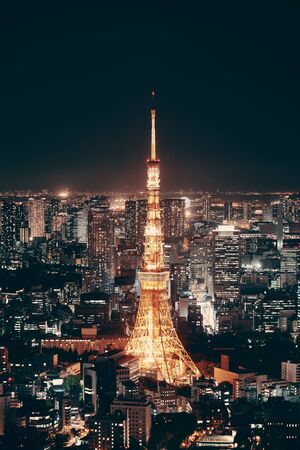 Tokyo Tower and urban skyline rooftop view at night, Japan.のeditorial素材