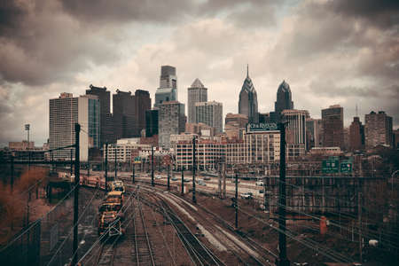 PHILADELPHIA, PENNSYLVANIA - MAR 26: city skyline with cargo train on March 26, 2015 in Philadelphia. It is the largest city in Pennsylvania and the fifth in the United States.のeditorial素材