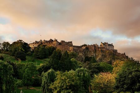 Edinburgh castle at sunset as the famous city landmark. United Kingdom.のeditorial素材