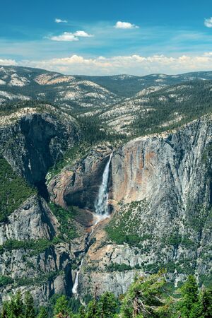Yosemite mountain ridge with waterfall.の写真素材