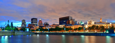Old architecture at dusk on street in Old Montreal in Canada panoramaの写真素材