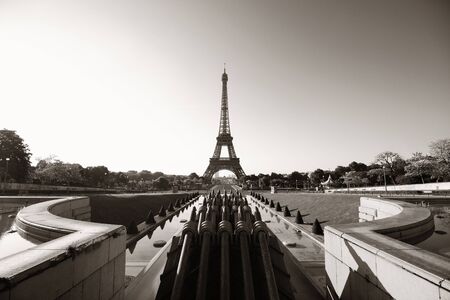 Eiffel Tower with fountain pipe as the famous city landmark in Parisの写真素材