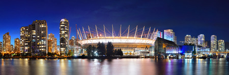 VANCOUVER, BC - AUG 17: BC Place Stadium at night with city buildings on August 17, 2015 in Vancouver, Canada. With 603k population, it is one of the most ethnically diverse cities in Canada.のeditorial素材