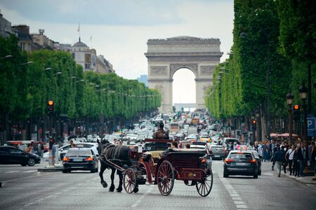 PARIS, FRANCE - MAY 13: street view and Arc de Triomphe on May 13, 2015 in Paris. With the population of 2M, Paris is the capital and most-populous city of Franceのeditorial素材