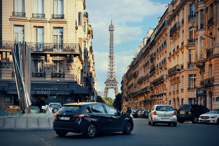 PARIS, FRANCE - MAY 13: Eiffel Tower and street view on May 13, 2015 in Paris. With the population of 2M, Paris is the capital and most-populous city of Franceのeditorial素材