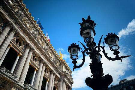 Palais Garnier with vintage lamp viewed from street in Paris.の写真素材