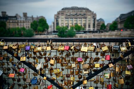 Huge amount of padlocks on bridge over River Seine in Parisのeditorial素材