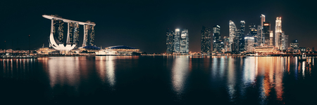 Singapore skyline at night with urban buildingsのeditorial素材